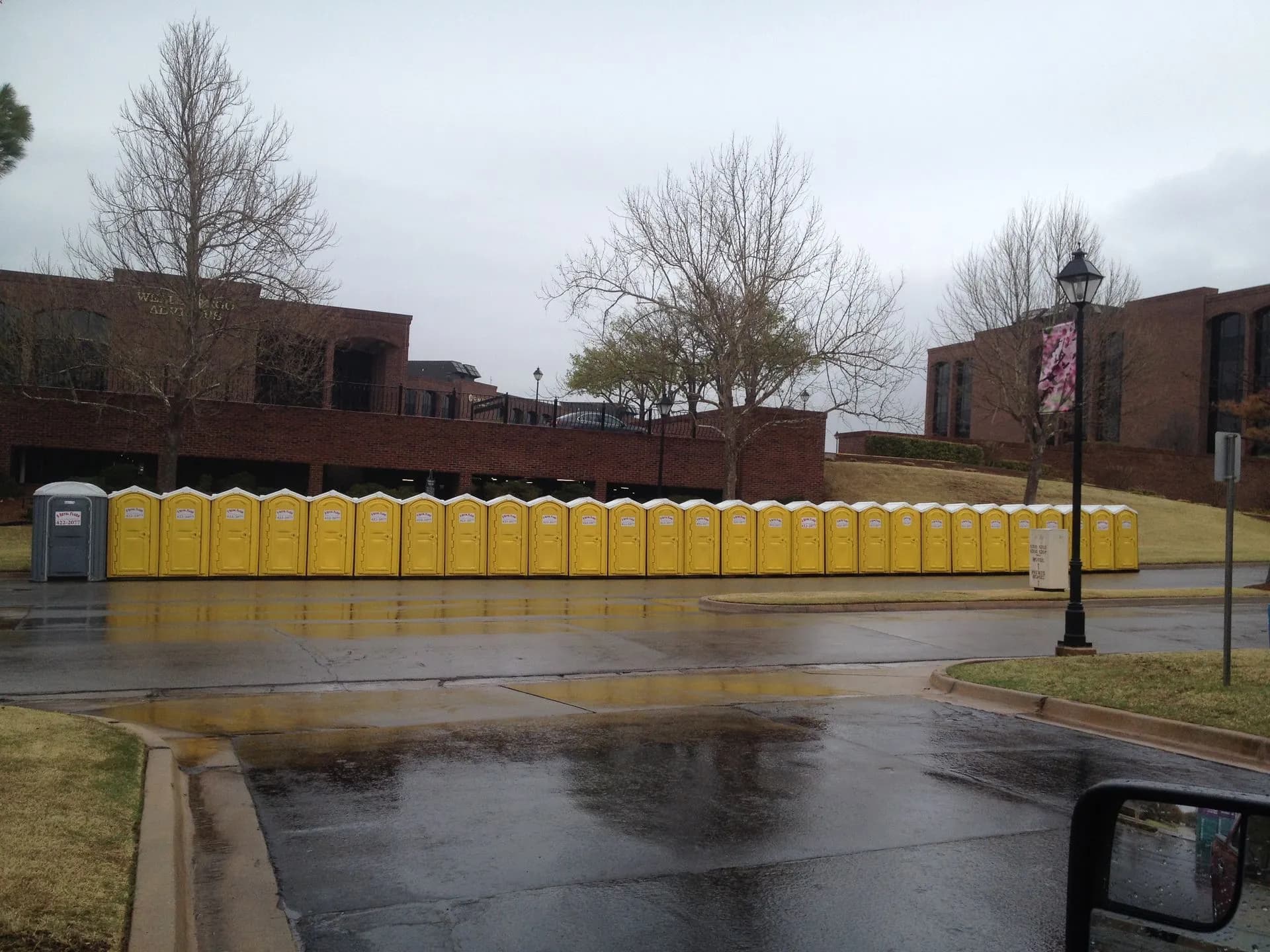 Portable toilets lined up outside a campus building