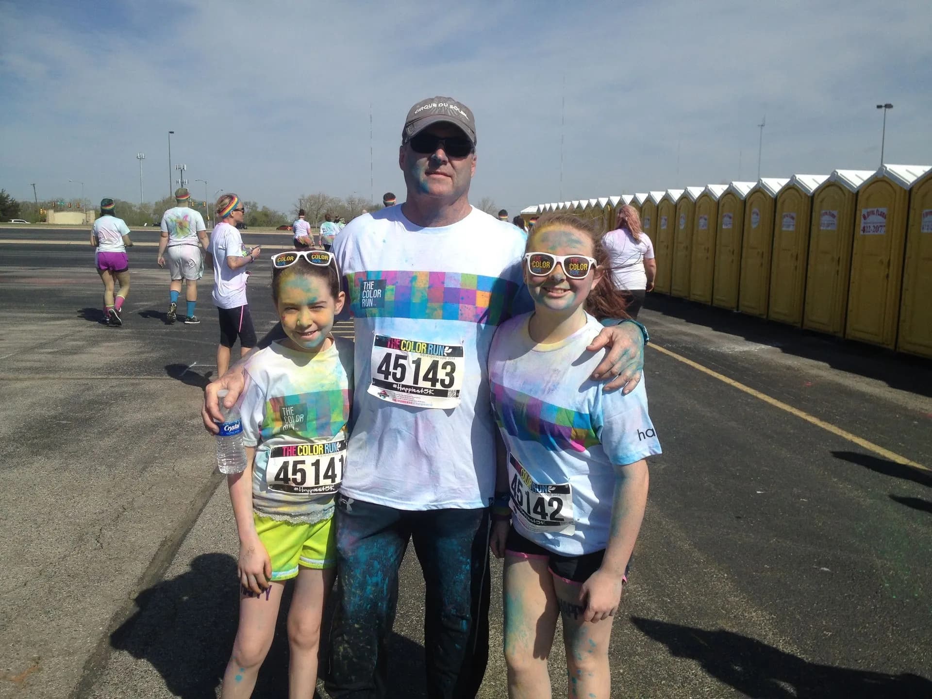 Color Run participants in front of A Royal Flush units