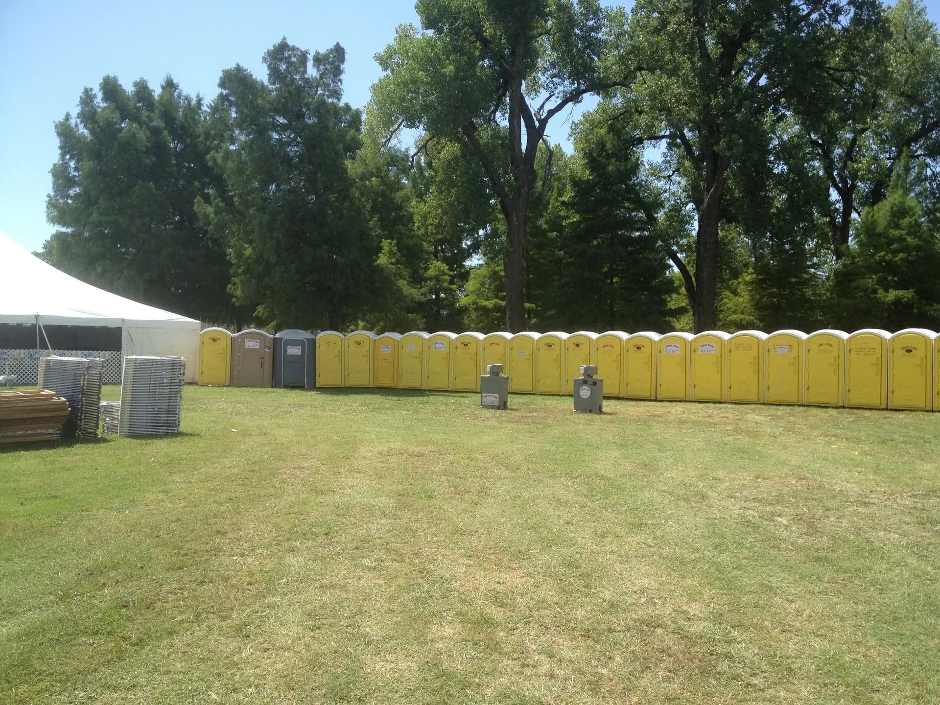Units placed along a tree line at a park event